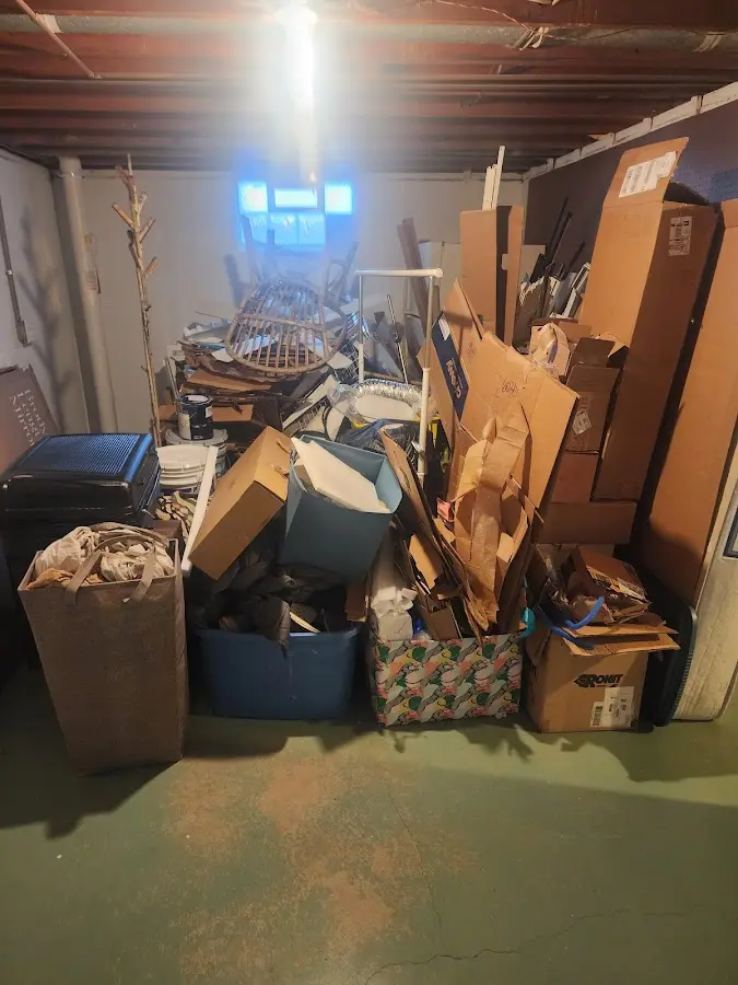 Roll-off dumpster container at job site for 2 Yard Dumpster Rental in Prattville